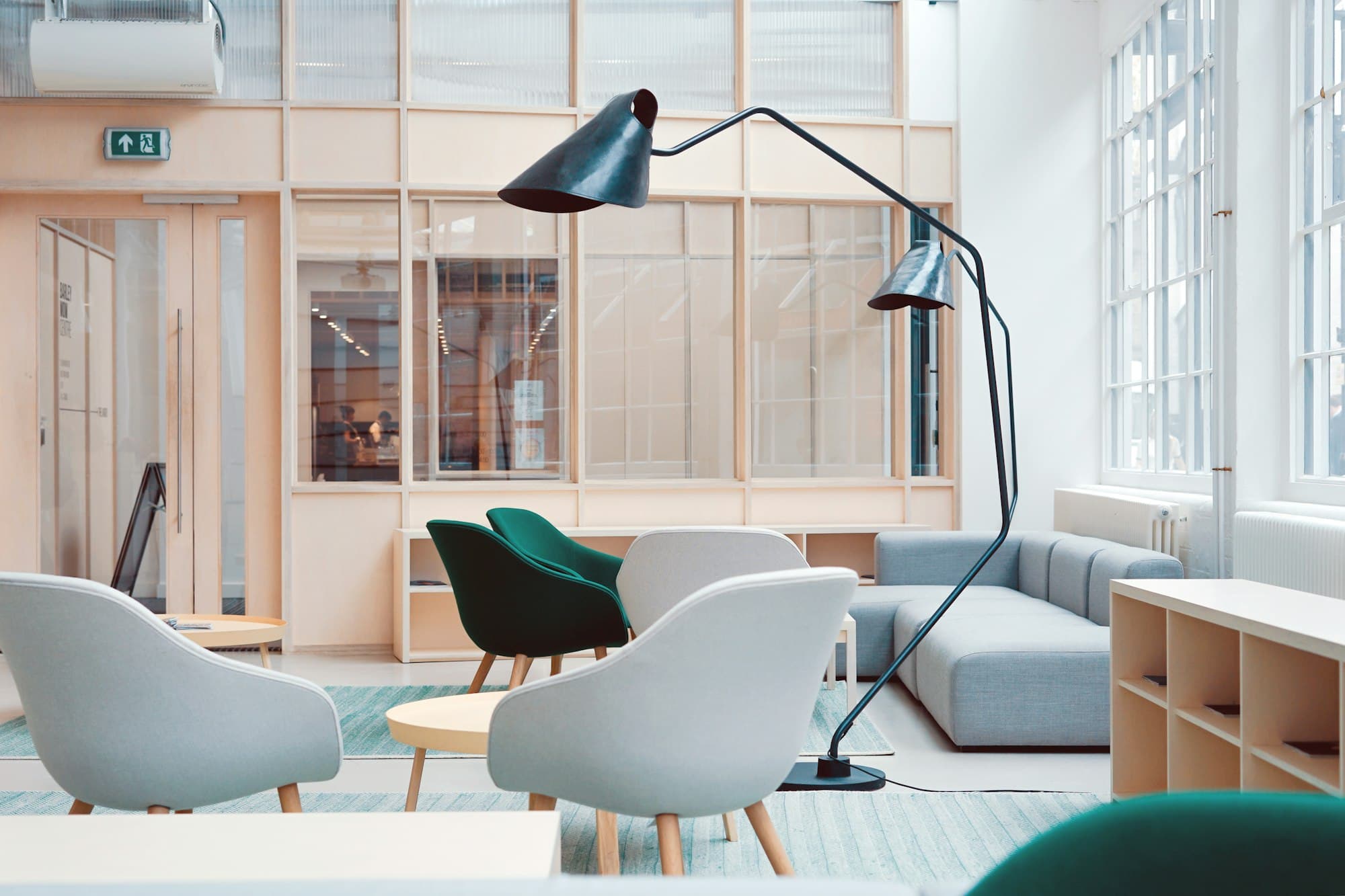 Layered ambient and accent lighting in a styled living room